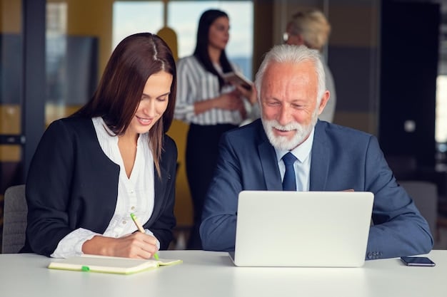 A lawyer explaining documents to a client in an office setting, with legal books and a laptop visible, representing the legal support required for bankruptcy proceedings.